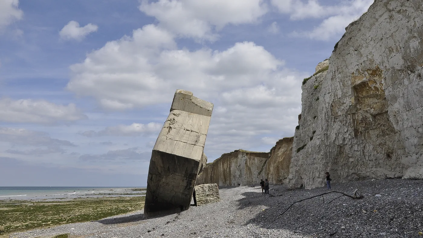 The toppled bunker of Sainte-Marguerite-sur-Mer tipped over onto the beach of the Alabaster Coast