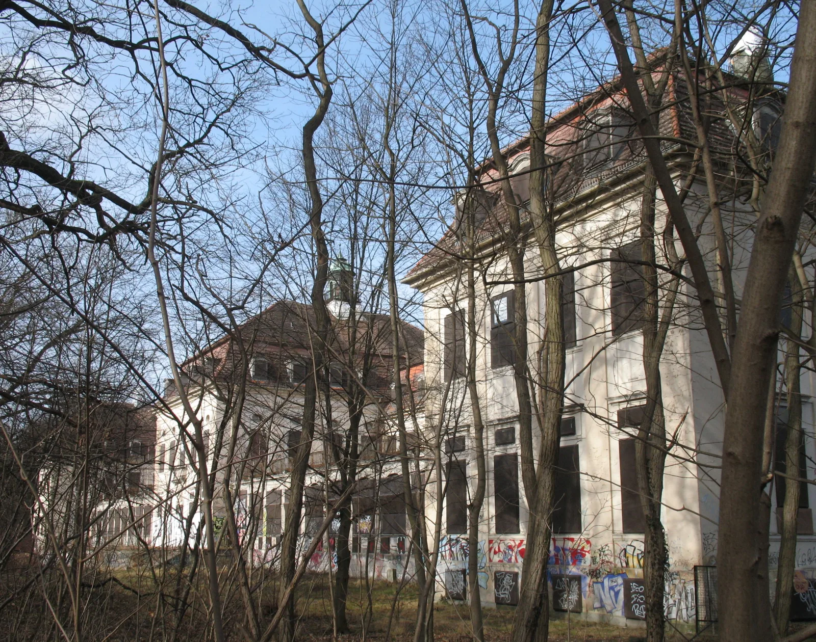 The abandoned former Waldhaus forest sanatorium in Berlin-Buch, hidden among trees