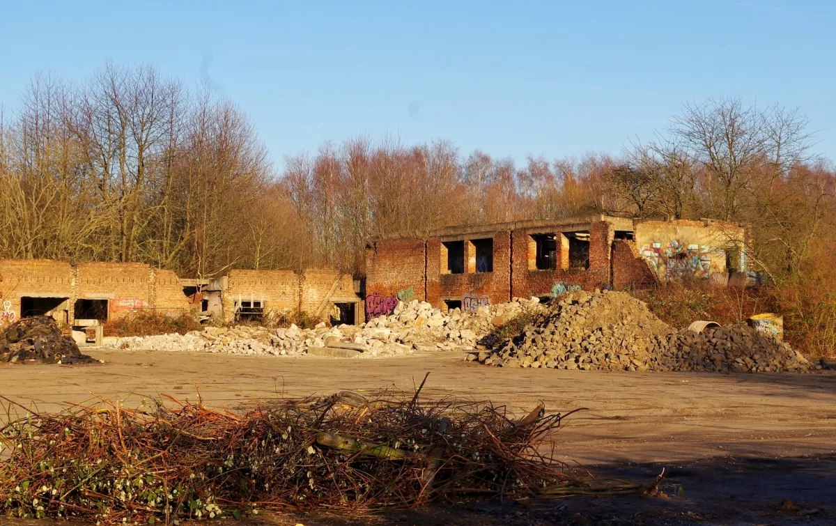 Derelict barracks and hangar of the former Eschborn airfield, overgrown and abandoned