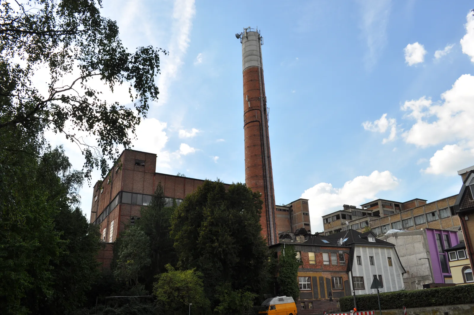 Brick buildings and chimney of the former Phrix cellulose and paper factory in Hattersheim-Okriftel on the Main