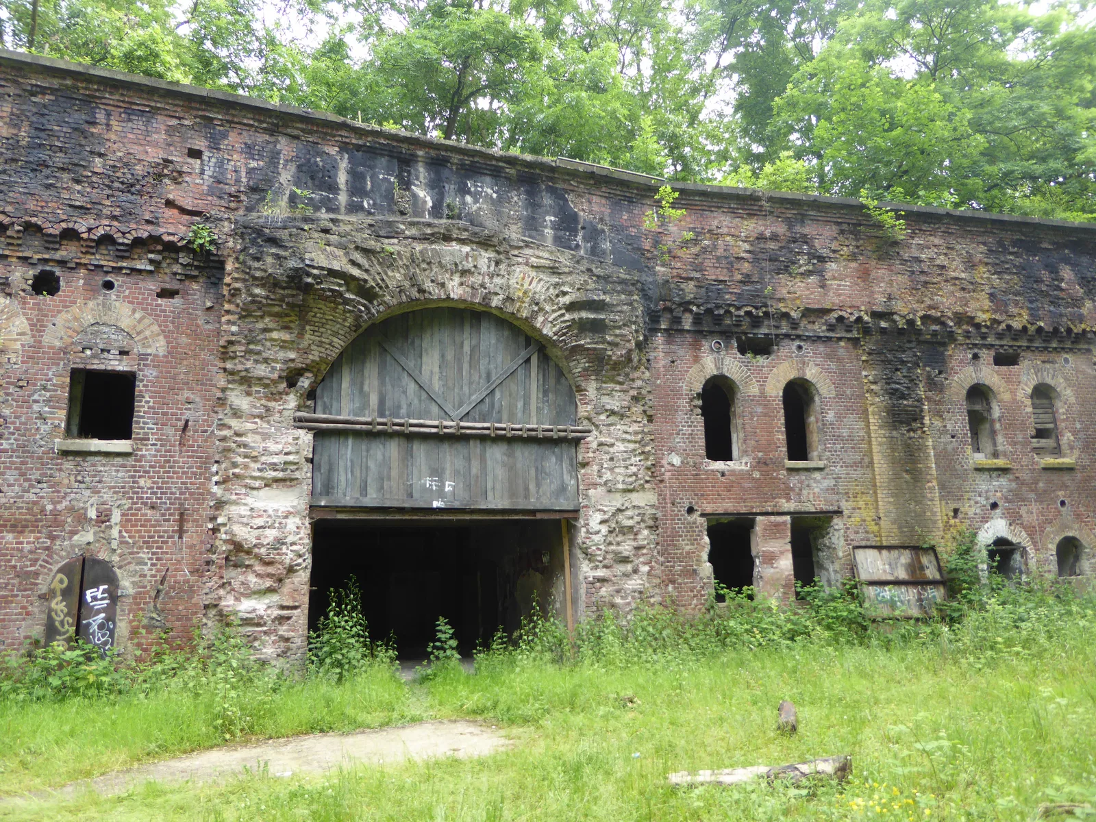 Overgrown casemates and rampart of the abandoned Fort IX in Cologne-Westhoven