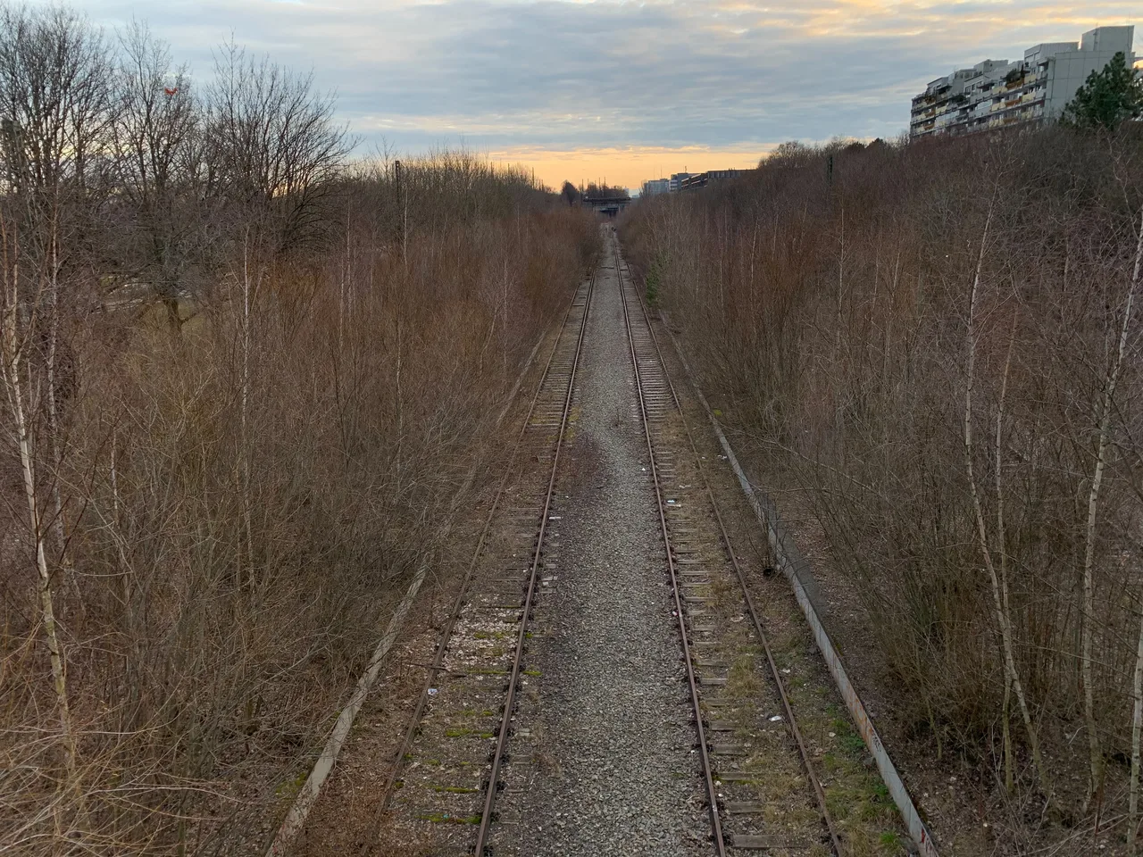 Abandoned overgrown tracks of the Munich Olympiastadion ghost station in the Olympic Park