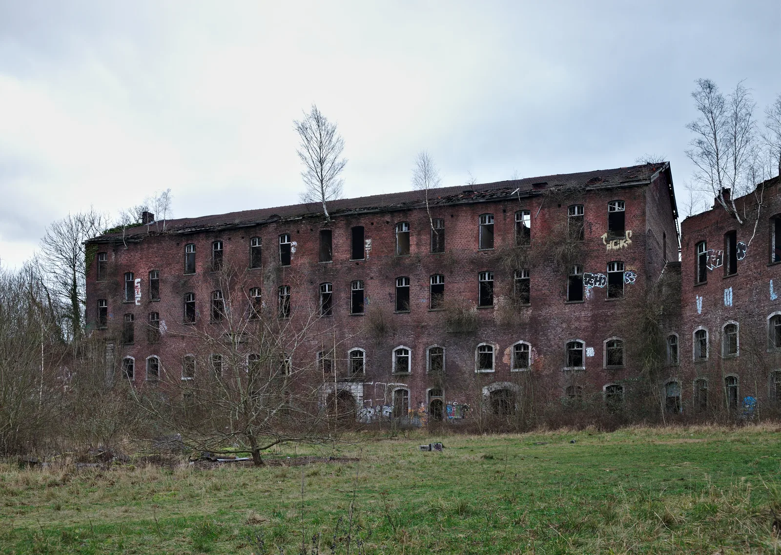 Abandoned military building with gutted brick walls at the Fort de la Chartreuse in Liège