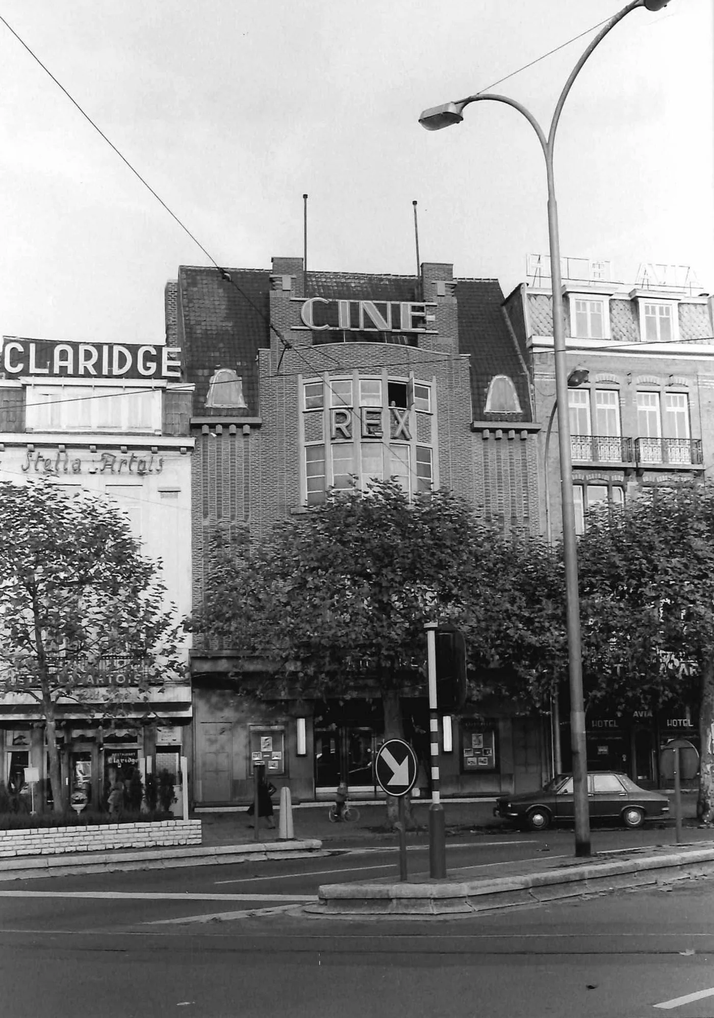 The Art Deco façade of the Cinema Rex in Ghent, with its CINE REX sign in brick